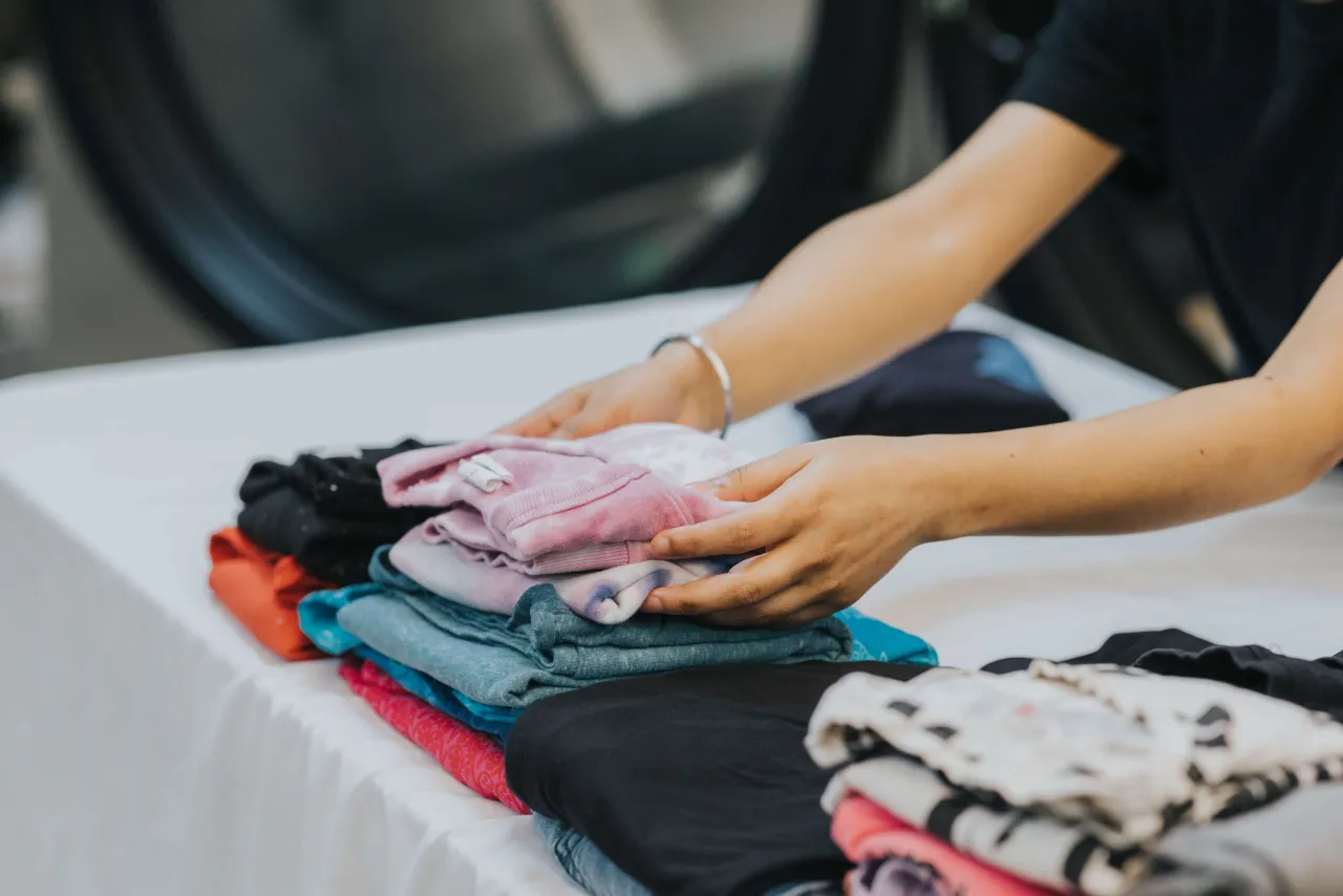Freshly cleaned laundry, folded and stacked by the Laundry Brothers team at the facility.